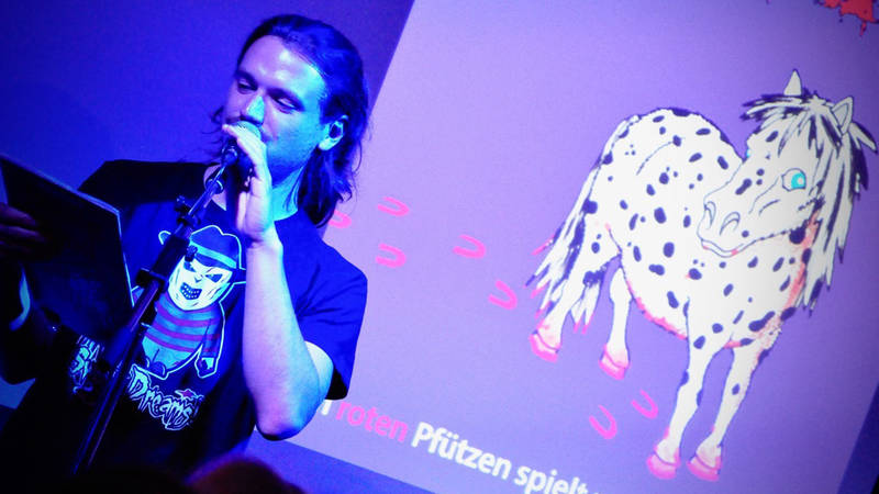 Multimedia-Lesung: Marien Loha @ Periplaneta Literaturcafé Berlin