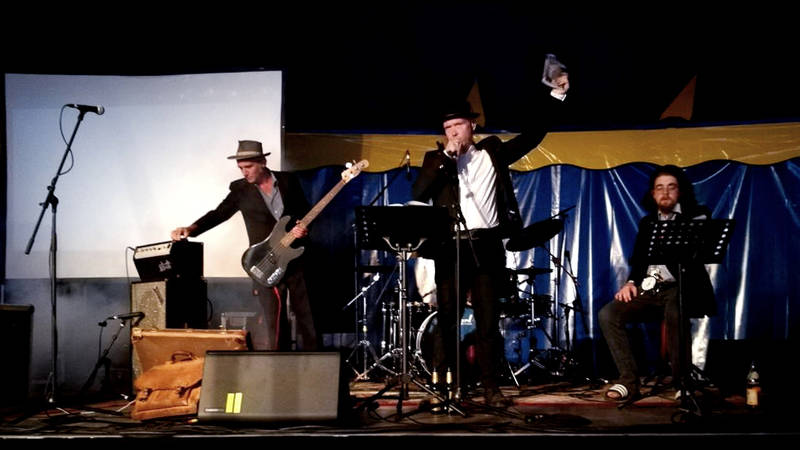 Lesung & Konzert: Drei Minuten für Jeden @ Periplaneta Literaturcafé Berlin